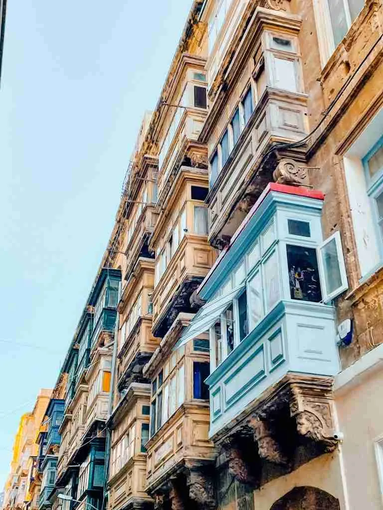A street with colorful balconies.