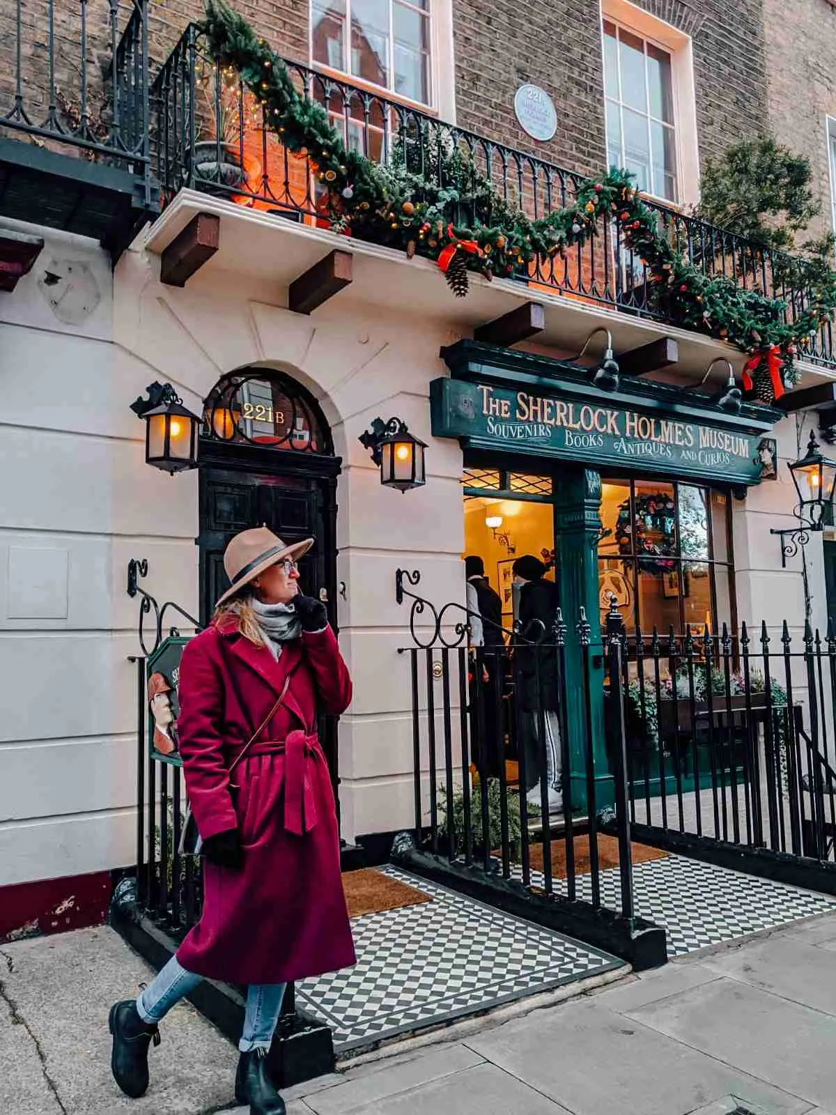 A girl standing outside of the Sherlock Holmes Museum in London on Baker Street - one of the most unique of London's museums