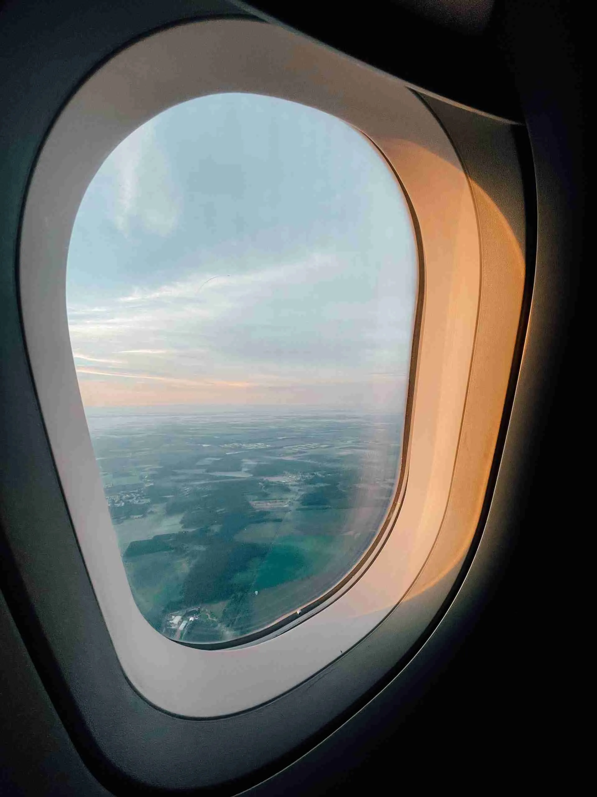 View from a plane window - finding flights is one of the most essential steps to travel planning! 