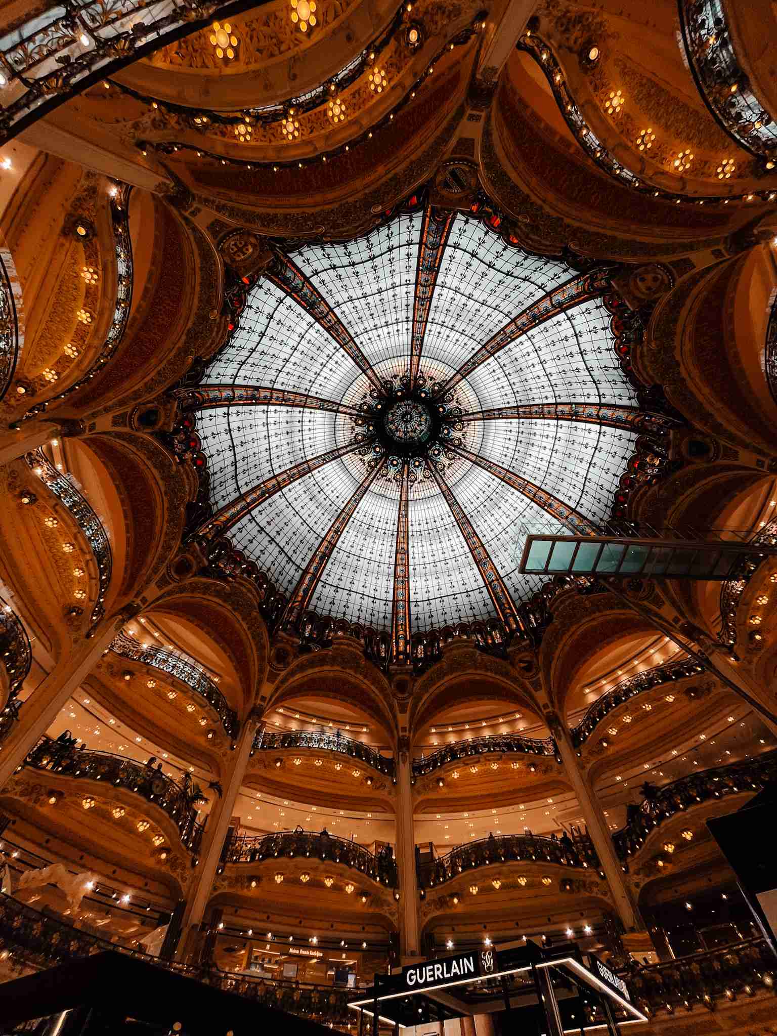 The magnificent glass dome inside the Galleries Lafayette - my go to spot when shopping in Paris