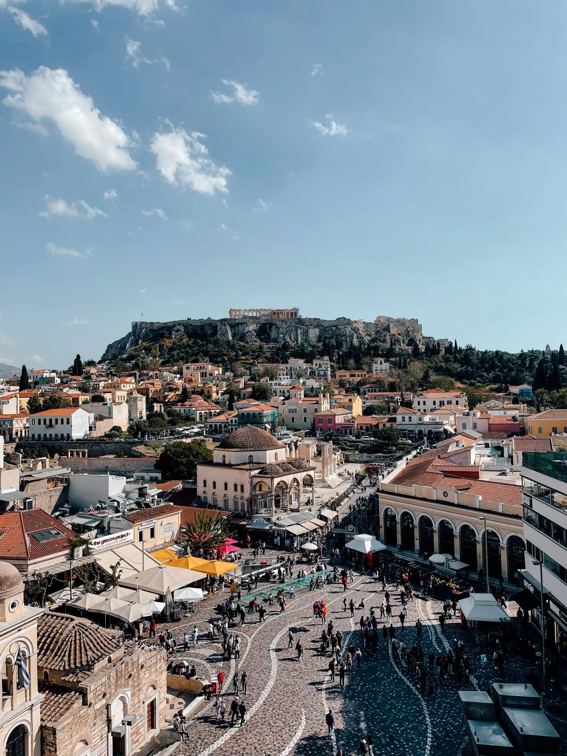 A view overlooking Monastiraki square with the Acropolis sitting in the background