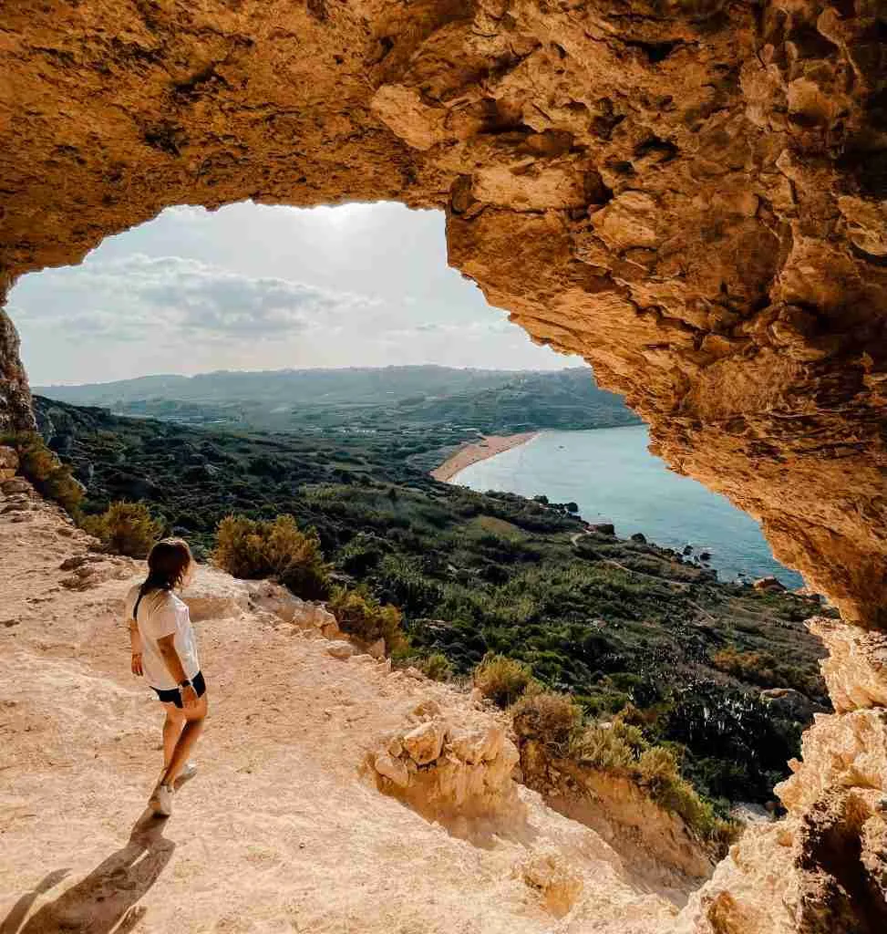 girl in cave overlooking Gozo