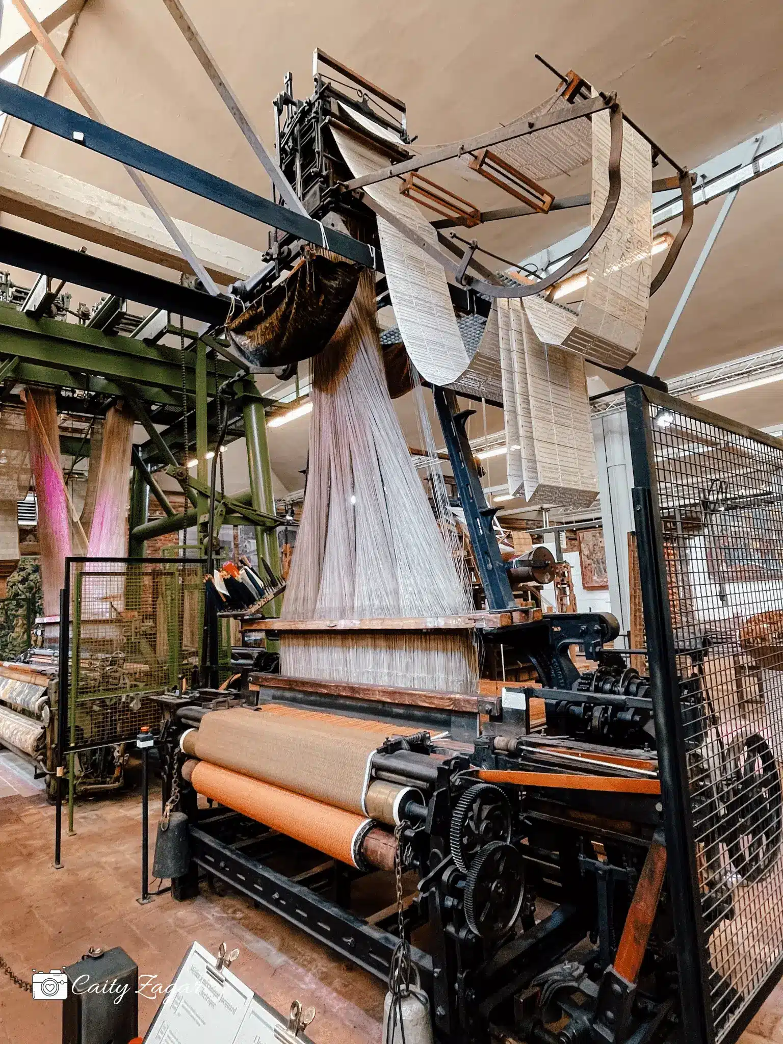 one of the most interesting things to do in Roubaix is visit La Manufacture - here you see a large loom with thousands of threads hanging above it