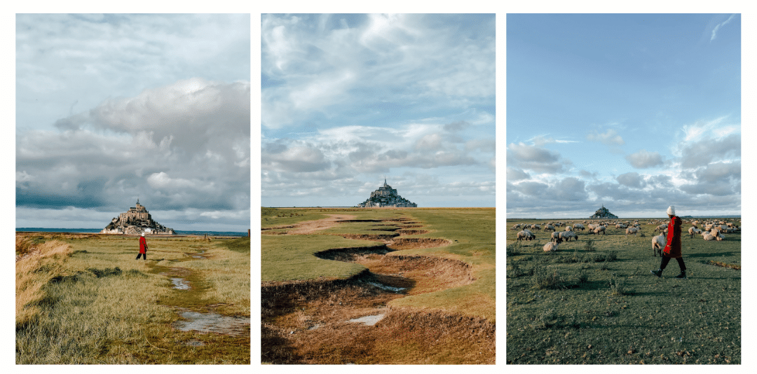 View of Mont St Michel from the mainland looking at it in the distance across farmers fields